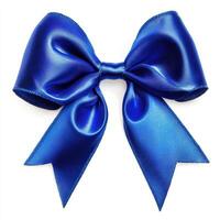 A shiny blue satin bow with long tails, often used for decoration or gift wrapping. photo