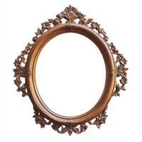 Ornate vintage mirror frame with intricate floral designs and an empty reflection space. photo