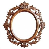 Ornate wooden mirror with intricate floral detailing and a classic oval shape. photo