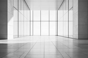 A minimalist interior space with large glass windows and a polished floor. photo