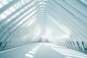 A spacious, modern architectural interior featuring white beams and ample natural light. photo