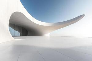 A modern architectural structure with flowing lines and a minimalist design against a clear sky. photo