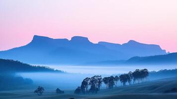 Serene landscape at dawn, showcasing misty mountains and soft pastel skies. photo