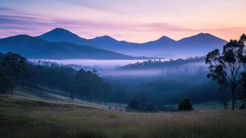 Serene mountain landscape at dawn with misty valleys and soft pastel skies. photo
