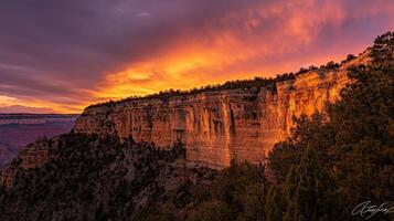 A breathtaking sunset over a rugged cliff, highlighting nature's beauty and tranquility. photo