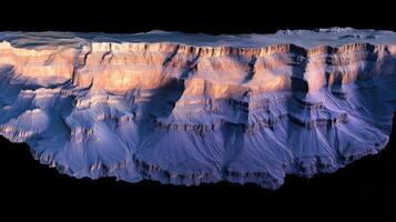 A stunning aerial view of a canyon showcasing intricate rock formations and colors. photo