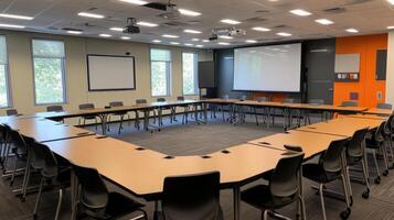 A modern conference room with a circular table setup for meetings or discussions. photo