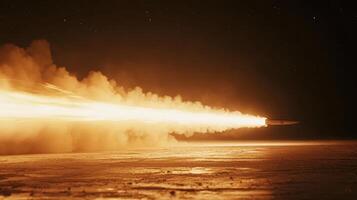 A missile launches with a fiery trail against a dark sky. photo