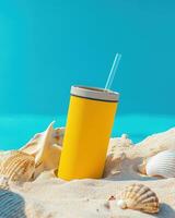 A bright yellow drink container sits on sandy beach with seashells, evoking summer vibes. photo