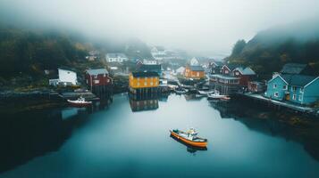A serene coastal village with colorful houses and boats reflected in calm waters. photo