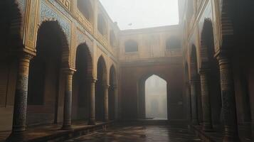 A misty courtyard with intricate arches and decorative tiles, evoking historical architecture photo