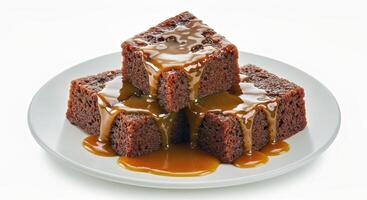 Sticky Toffee Pudding Show Sticky Toffee Pudding Arranged in a Bowl photo