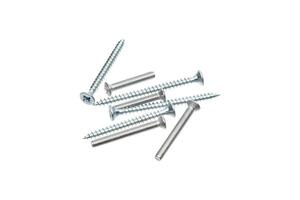A close-up shot of silver screws scattered on a white background, highlighting various thread patterns and head designs. photo