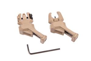 A lightweight tan polymer front and rear sight set, featuring a flip-up design, presented on a plain white backdrop. photo