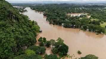 Chiang Rai beach flooding by Kok river after typhoon Yagi has swept Southeast Asia. photo