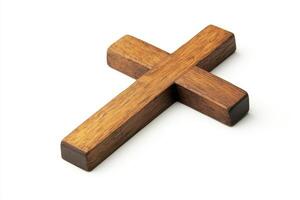 Wooden Christian cross isolated on white background photo