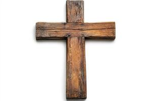 Old wooden cross with weathered texture, isolated on white background photo