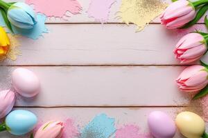 Easter mockup with pastel tulips and eggs on white wood background in flat lay style with copy space for greeting or design template photo
