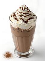 A chocolate milkshake with whipped cream and chocolate sauce photo