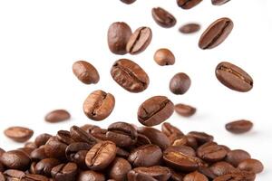 Coffee beans falling isolated on white background photo
