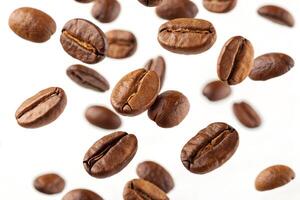 Coffee beans falling in the air on a white background photo