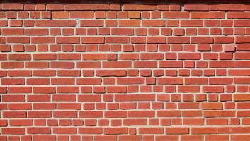 Red Brick Wall with Varied Patterns photo