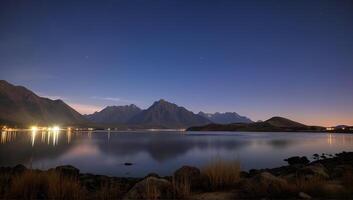 Serene Mountain Lake Under Starry Night Sky photo