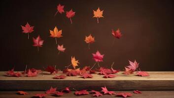 Falling Autumn Leaves on Wooden Surface photo