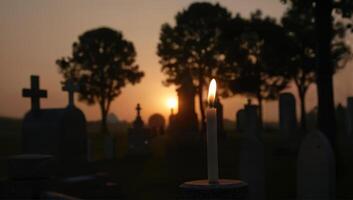 Candlelight in Cemetery at Sunset photo