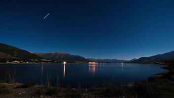 Starry Night Over Serene Mountain Lake photo