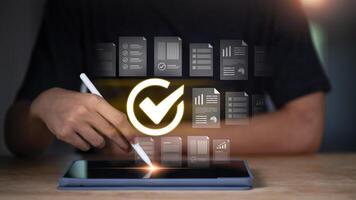 accountant Audit documents, Accountant showing office document auditing concept , plan review process and assess correctness , Management of important document storage of organization photo