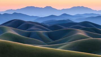 Rolling Hills Underneath Distant Mountain Ranges photo