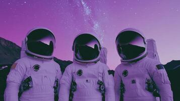 Three Astronauts Stand on a Purple Planet Underneath a Starry Sky photo