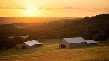 Golden Sunset Over Rolling Hills and Farm Barns photo