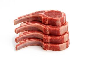 Stack of raw lamb chops with bone on white background, fresh uncooked meat ideal for grilling, roasting, or gourmet preparation photo