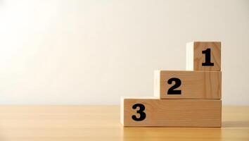 Wooden Blocks Numbered 1 2 3 Showing Ranking or Success Steps on Table photo