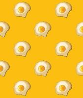 Fried egg pattern with yellow background. Creative concept vector