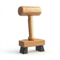 Wooden mallet resting on a small wooden block base photo