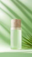 A jar of green liquid with a wooden lid on a green background photo