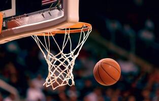 Basketball gracefully sails through the net, showcasing a perfect shot in a competitive atmosphere photo