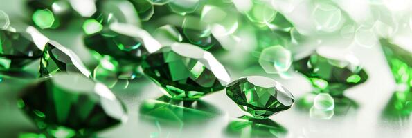 Vibrant emerald gemstones glisten against a white background, showcasing their intricate facets photo