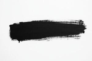 A textured black paint stroke spans horizontally across a bright white canvas, emphasizing the contrast and depth of color in a creative design photo