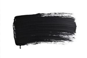 A long rectangular black paint stroke displays smooth, textured lines against a stark white background, emphasizing contrast and simplicity in design photo