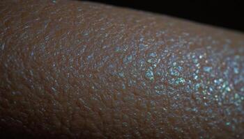 A close up of a scale on a reptile, capturing its texture, pattern, and iridescent sheen. photo