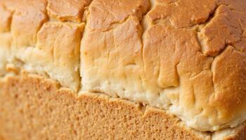 The texture of freshly baked bread, with a golden crust and soft, airy interior. photo