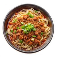 Spaghetti with meat and sauce in a bowl on a white background photo