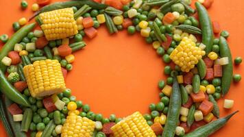 A wreath made of vegetables and corn photo