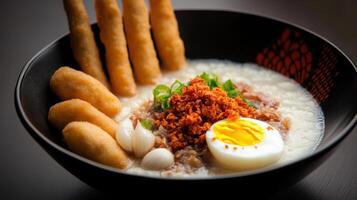 A bowl of rice with an egg and some bread sticks photo