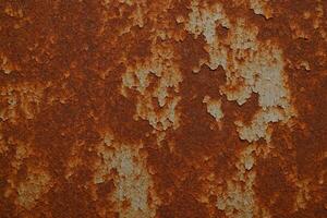 Rusty Metal Sheet Texture with Corrosion and Peeling Paint Surface for Industrial Design and Background Concepts photo