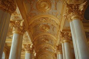 Ornate golden ceiling and marble columns creating a luxurious ambiance photo
